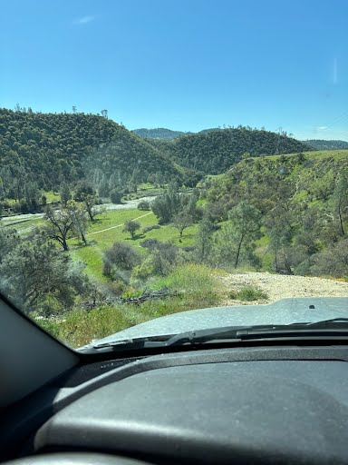 Guided hunt truck scouting private ranch canyon terrain