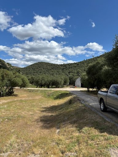 Hunting guide 4x4 truck navigating private ranch road