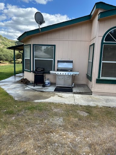 Hunting lodge BBQ patio grill and cookout station