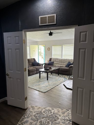 Hunting lodge front entryway opening into main living room
