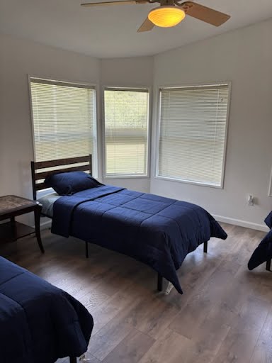 Hunting party bunk room with multiple twin beds