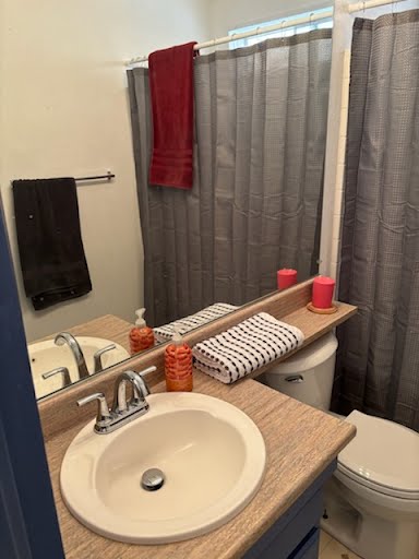 Ranch lodge full bathroom with vanity and clean amenities